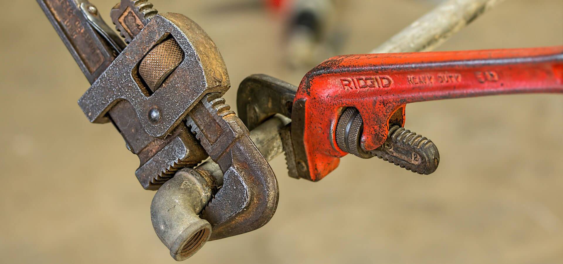 Close-up of an adjustable pipe wrench. Close-up of an adjustable pipe wrench.